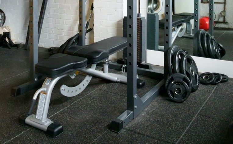 Workout equipment on rubber flooring